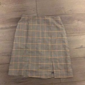 Black, orange, and white checkered/plaid skirt xs